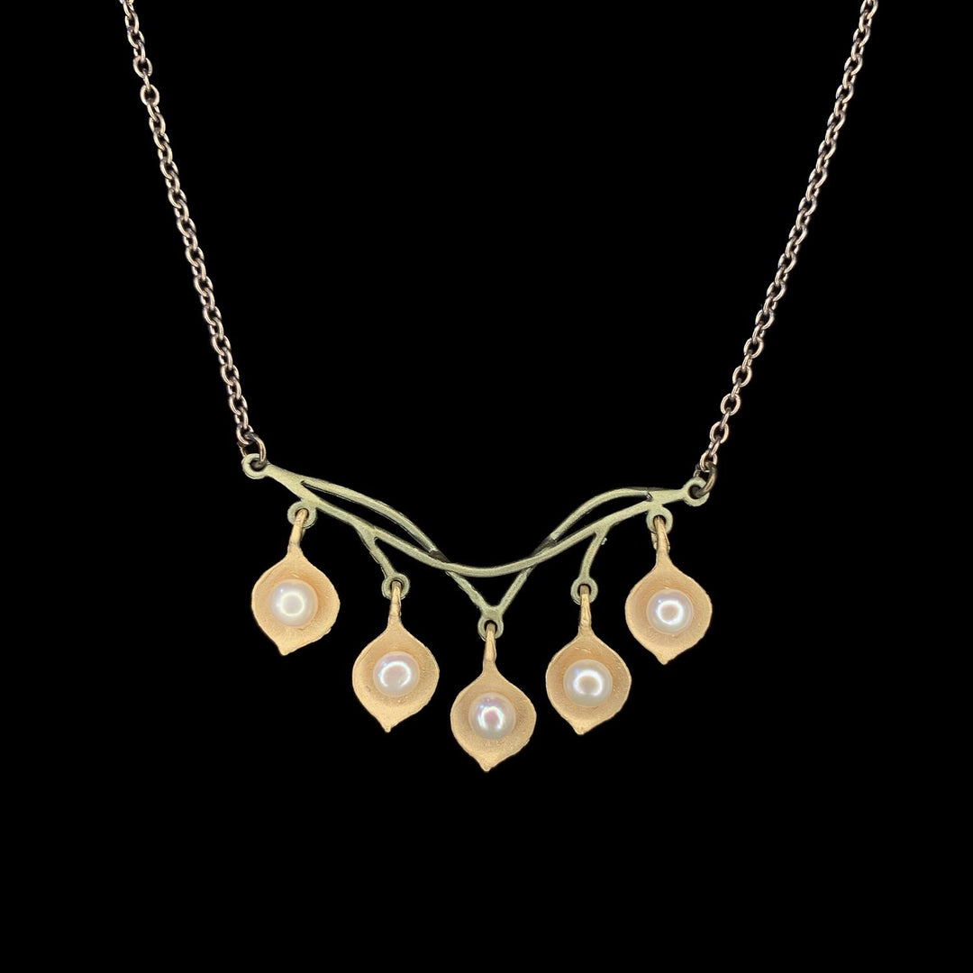 Image of the Michael Michaud Round Leaf Eucalyptus Necklace - Bar on a black background