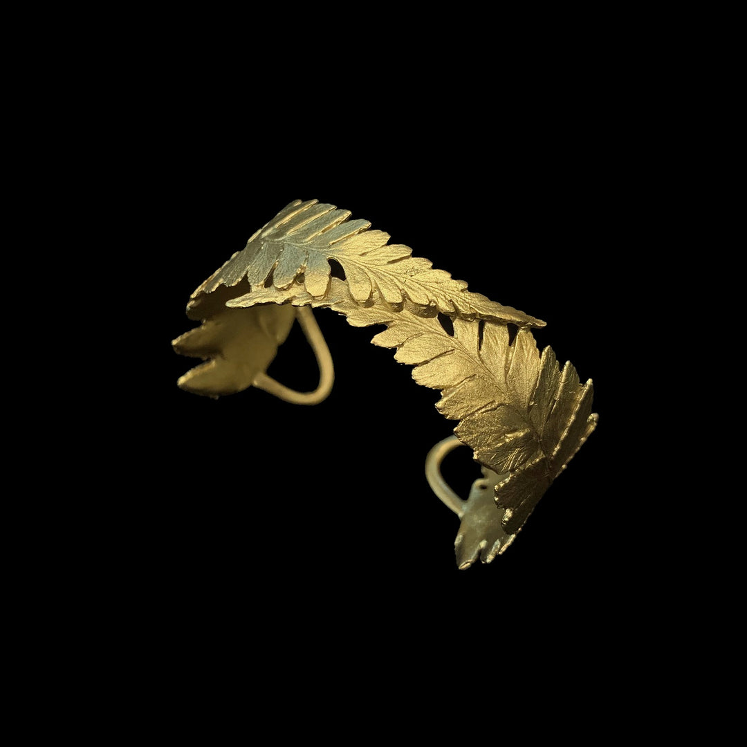 Image of the Michael Michaud Fern Cuff on a black background