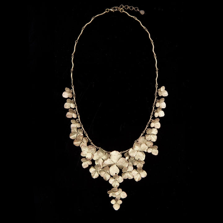Image of the Michael Michaud Hydrangea Necklace - Full Petals on a black background
