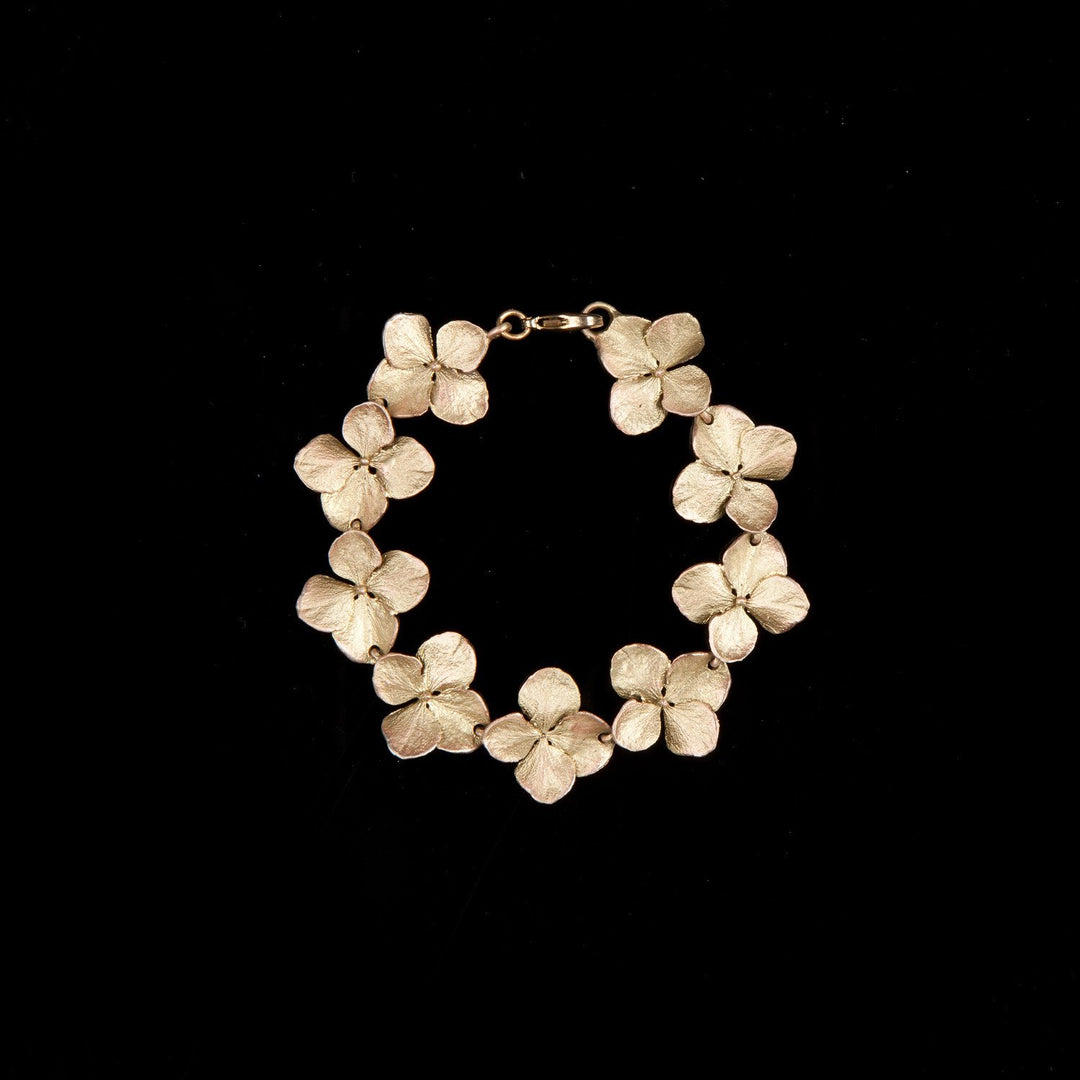 Image of the Michael Michaud Hydrangea Bracelet on a black background