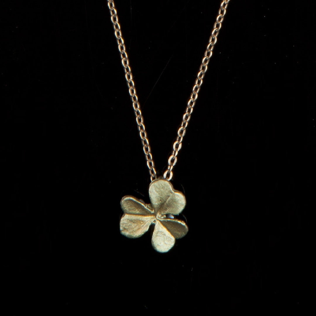 Image of the Michael Michaud Clover Pendant on a black background