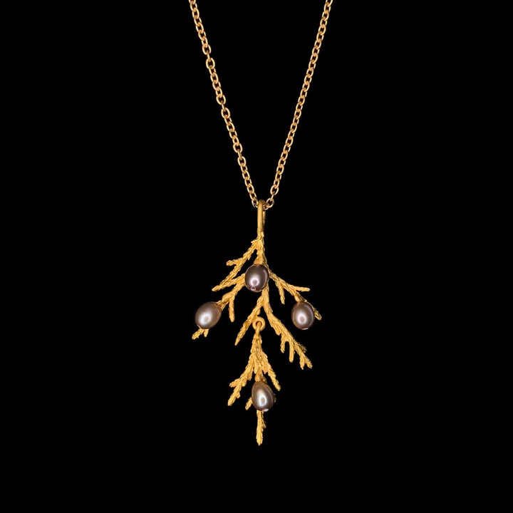 Image of the Michael Michaud Juniper Pendant on a black background