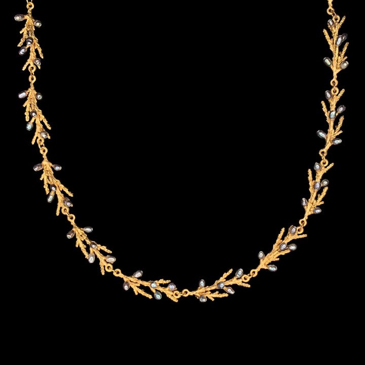 Image of the Michael Michaud Juniper Necklace - Dainty Statement on a black background