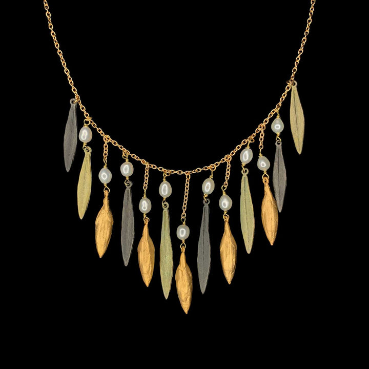 Image of the Michael Michaud Leaf and Bud Necklace - Statement on a black background