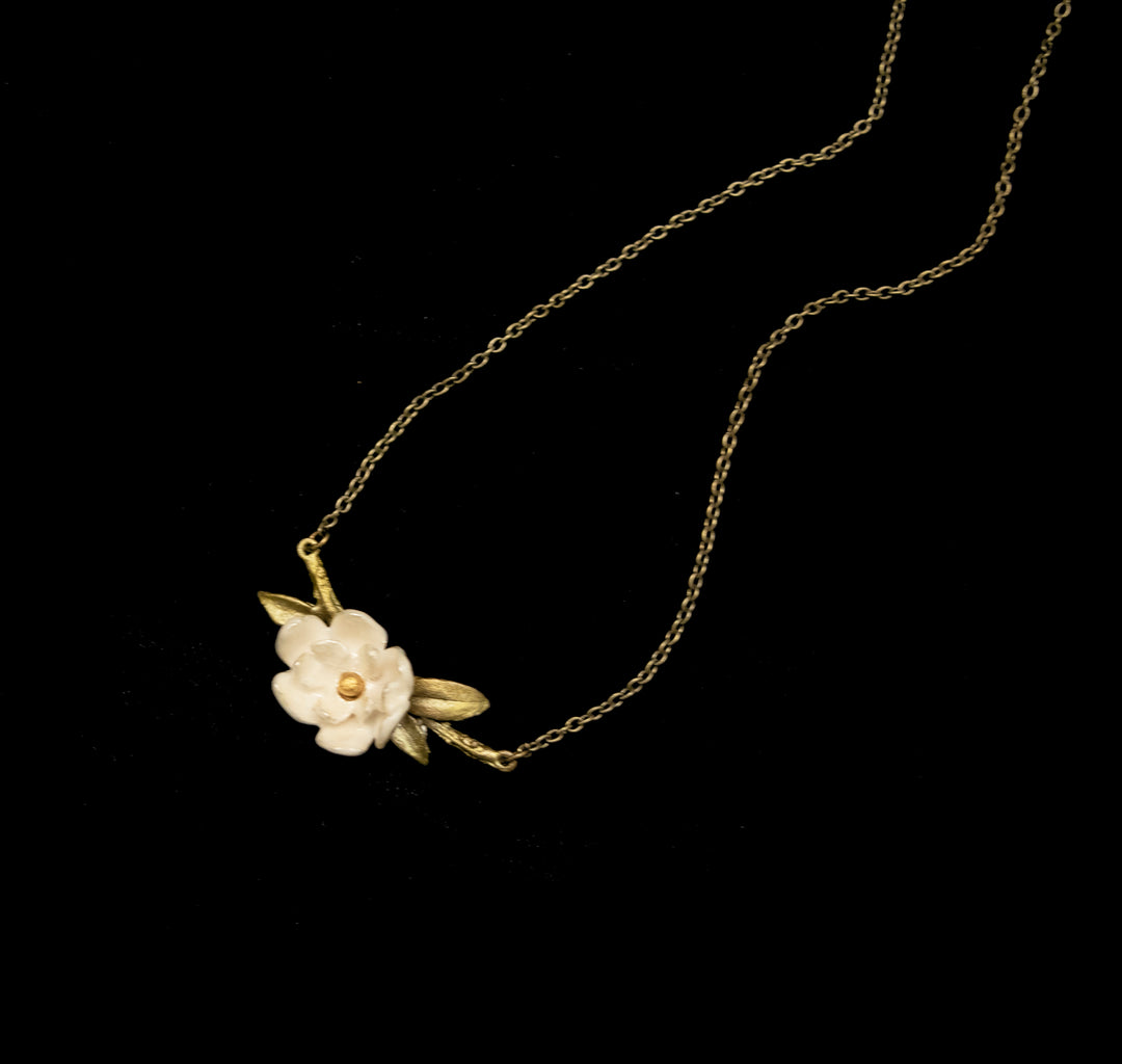 Image of the Michael Michaud Magnolia Branch Pendant on a black background