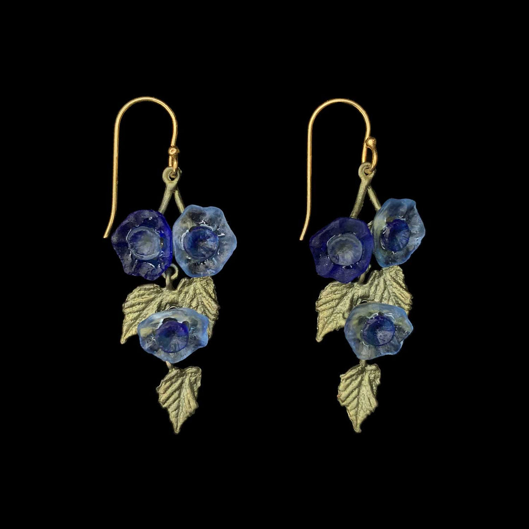 Image of the Michael Michaud Morning Glory Earrings - Flower Wire on a black background