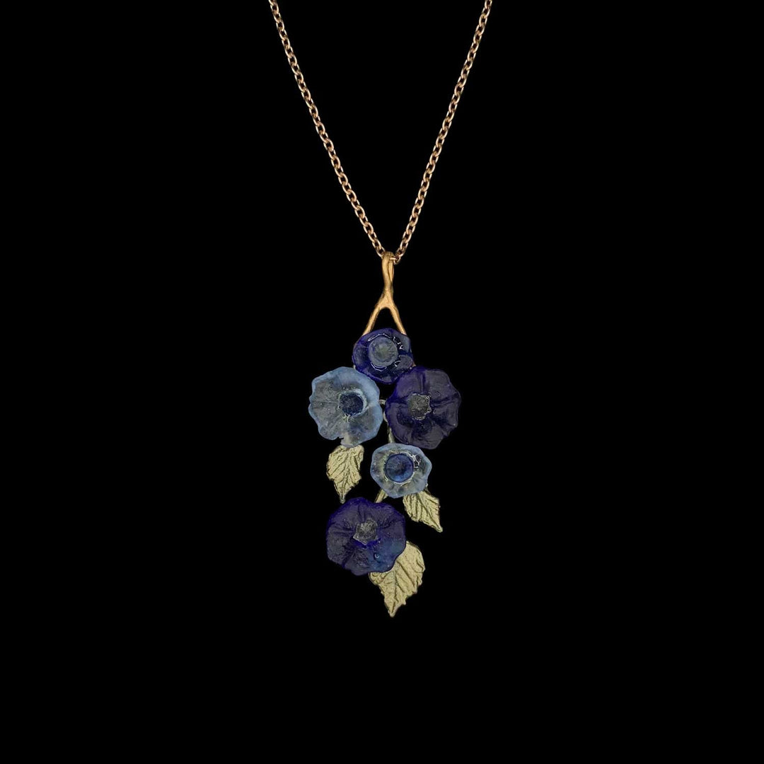 Image of the Michael Michaud Morning Glory Pendant on a black background