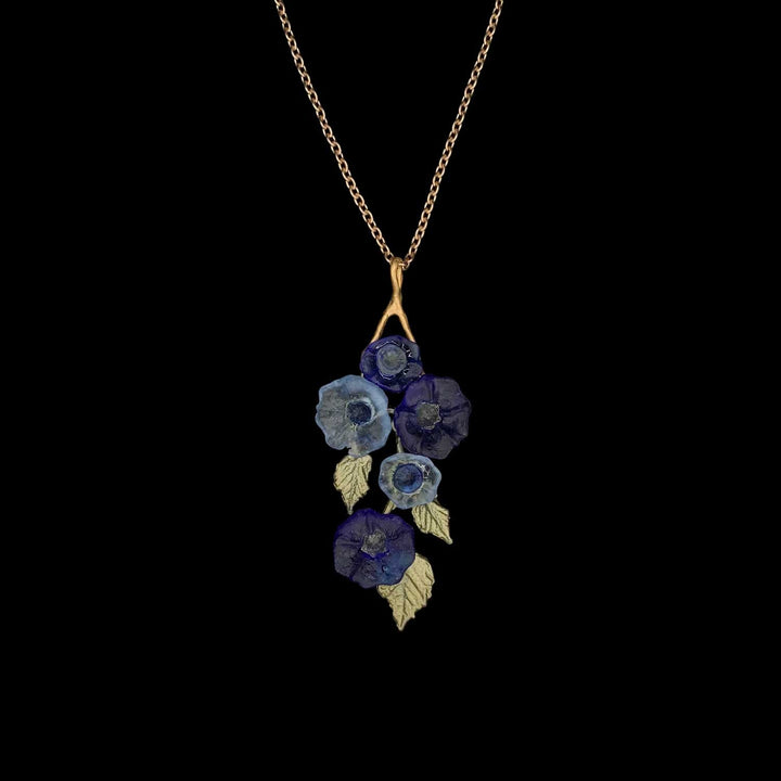 Image of the Michael Michaud Morning Glory Pendant on a black background