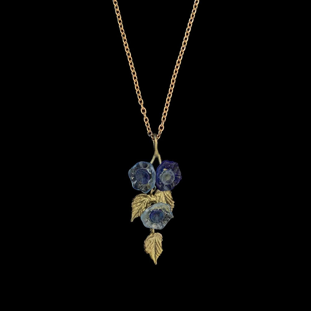 Image of the Michael Michaud Morning Glory Pendant - Dainty Flowers on a black background