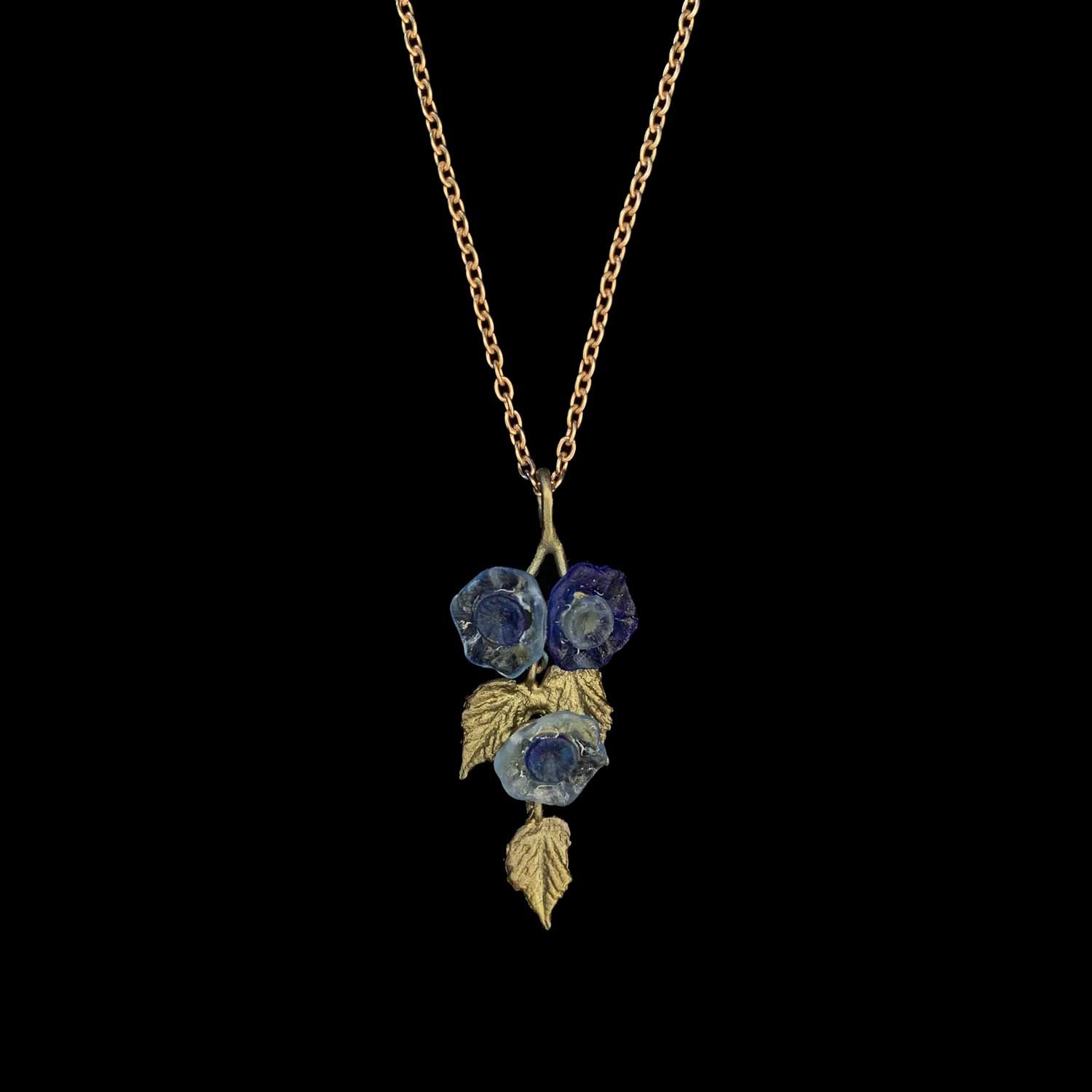 Image of the Michael Michaud Morning Glory Pendant - Dainty Flowers on a black background