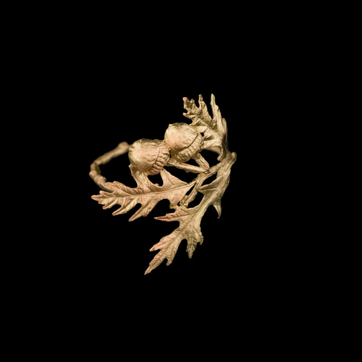 Image of the Michael Michaud Acorn & Oak Napkin Rings on a black background