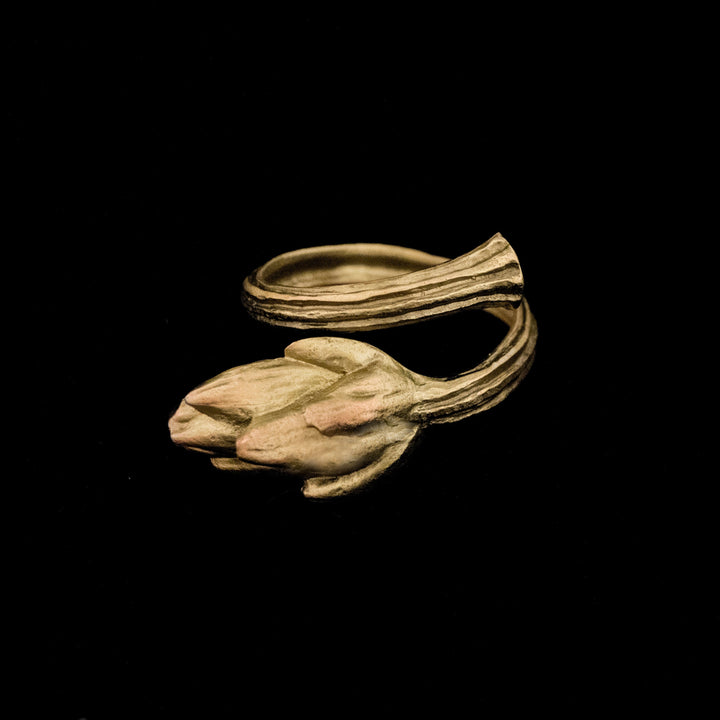 Image of the Michael Michaud Artichoke Napkin Rings on a black background