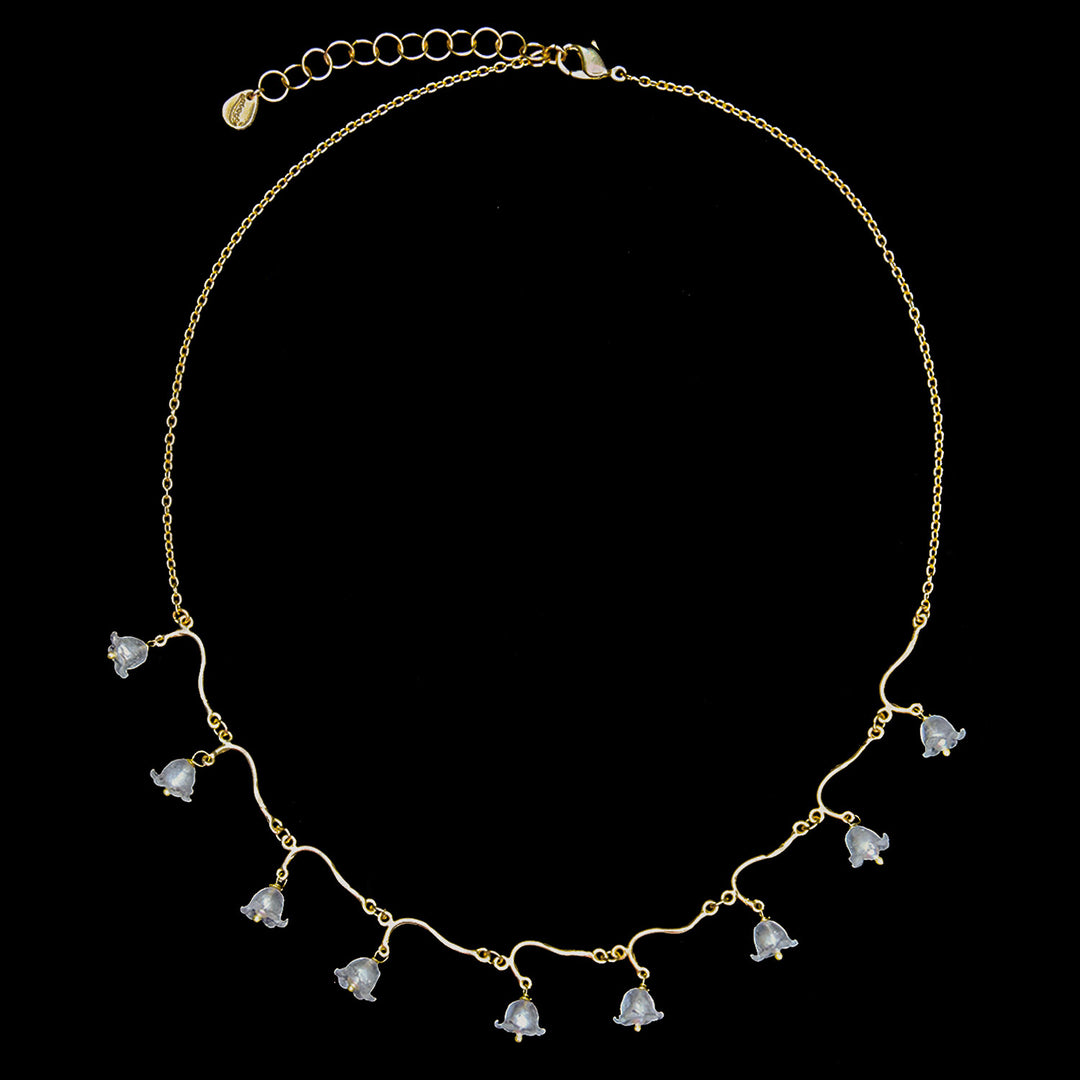 Image of the Michael Michaud Fine Lily of the Valley Necklace - Statement on a black background