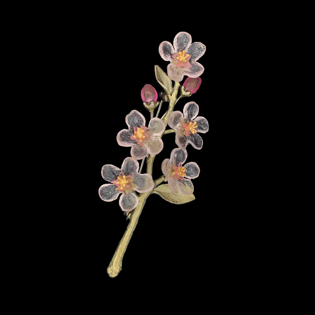Image of the Michael Michaud Peach Blossom Brooch on a black background