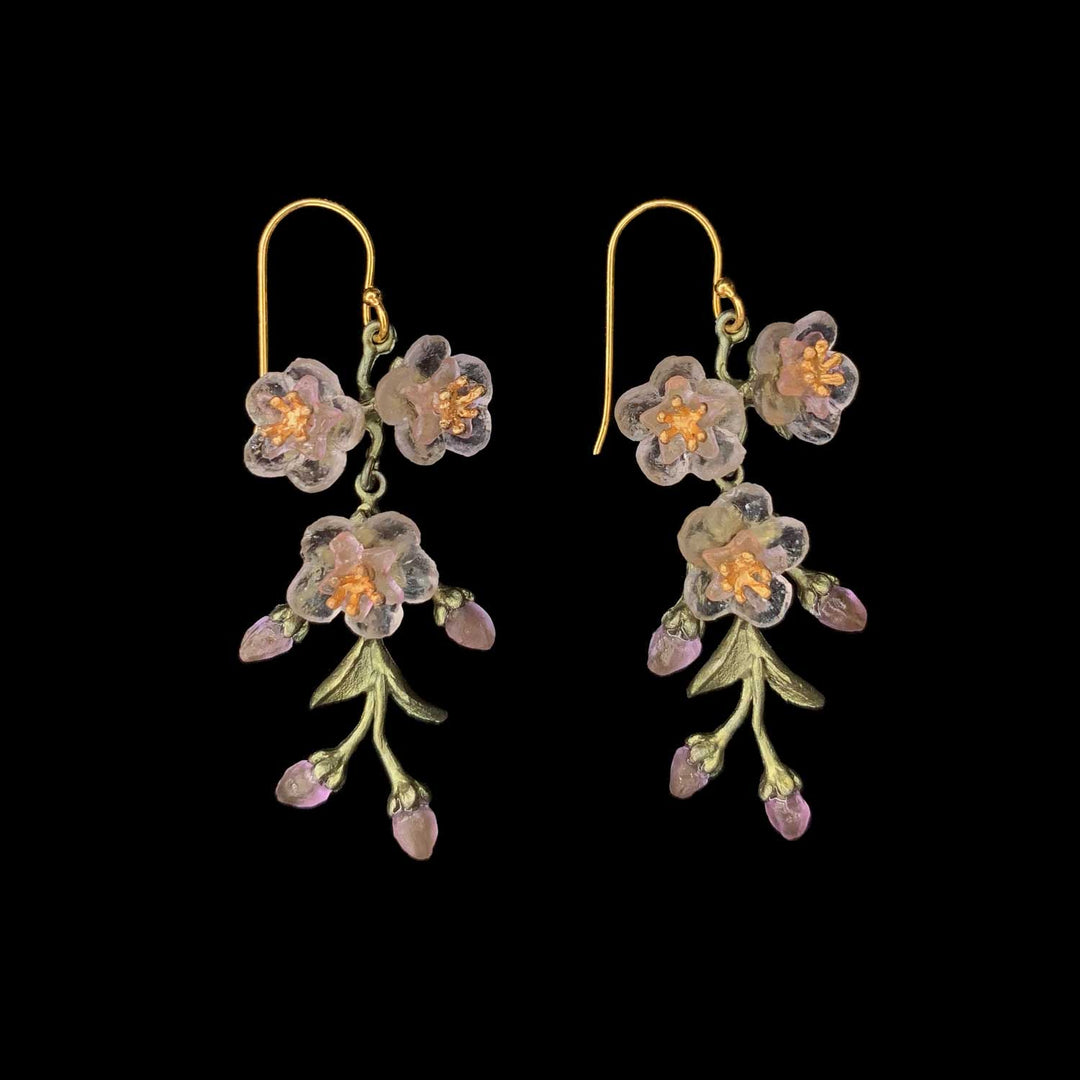Image of the Michael Michaud Peach Blossom Earrings - 3-Flower Drop Wire on a black background