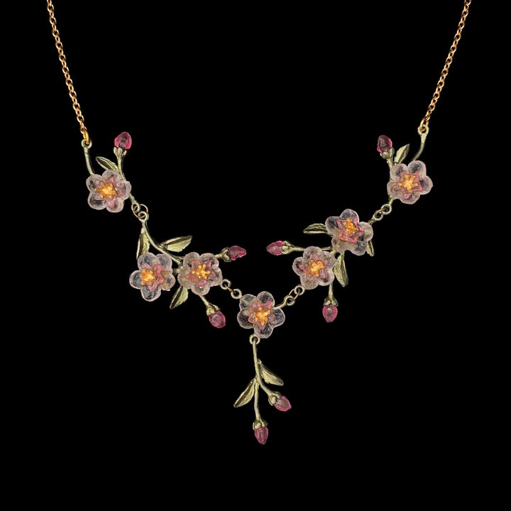 Image of the Michael Michaud Peach Blossom Necklace on a black background