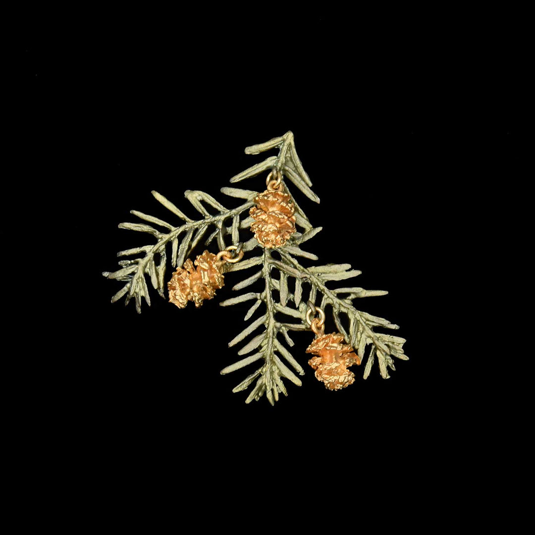 Image of the Michael Michaud Pine Needle Brooch on a black background