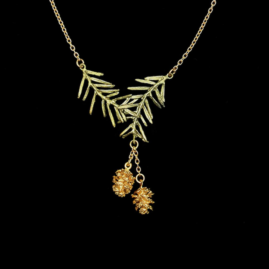Image of the Michael Michaud Pine Needle Pendant on a black background