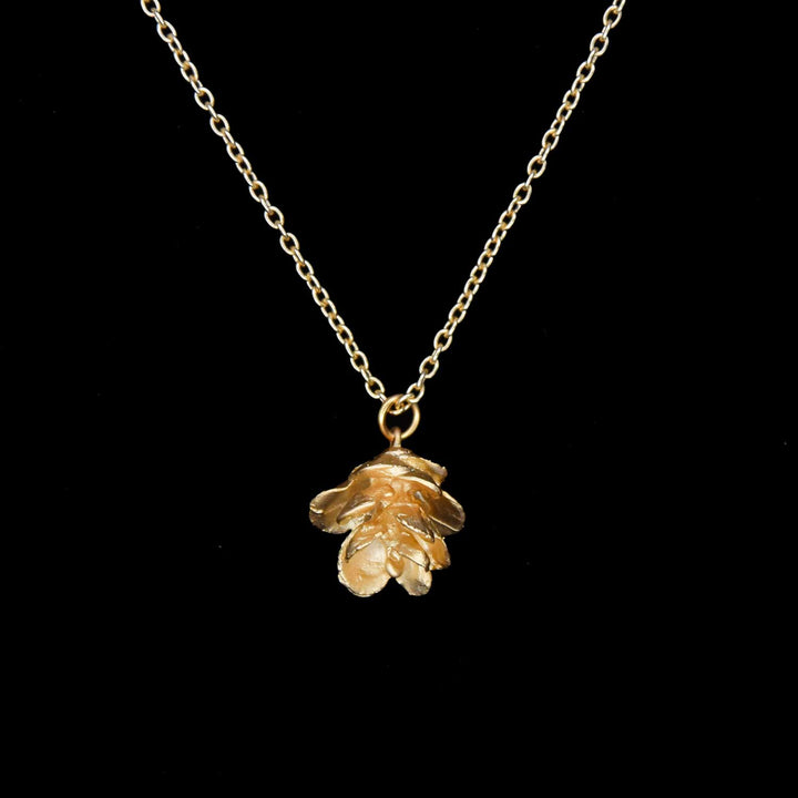 Image of the Michael Michaud Pine Needle Pendant - Single Cone on a black background