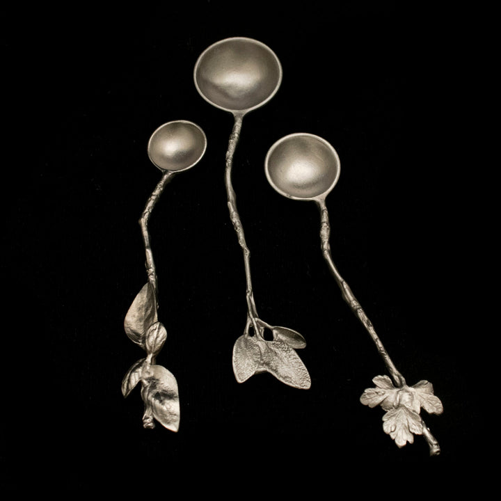 Image of the Michael Michaud Herb Nesting Spoons - Pewter on a black background