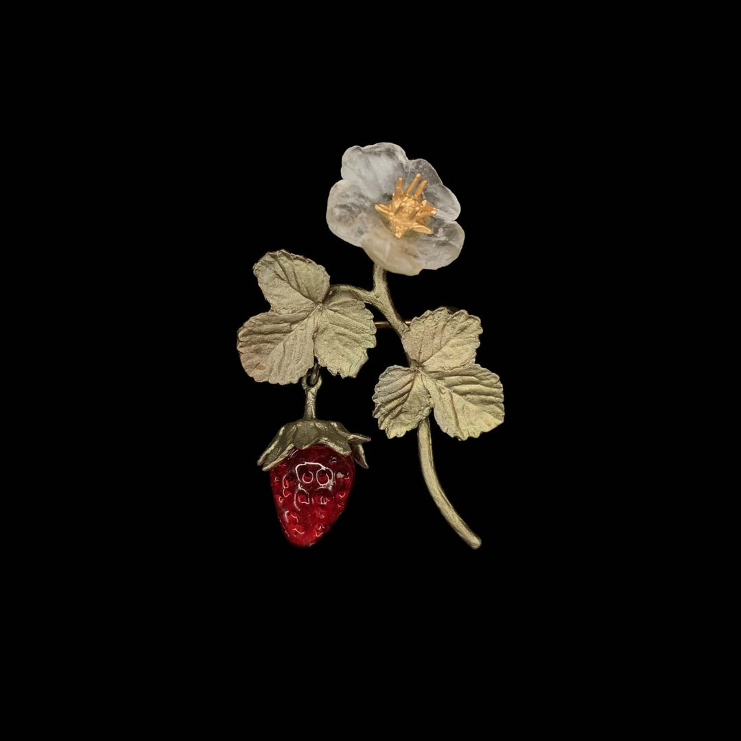 Image of the Michael Michaud Strawberry Brooch on a black background