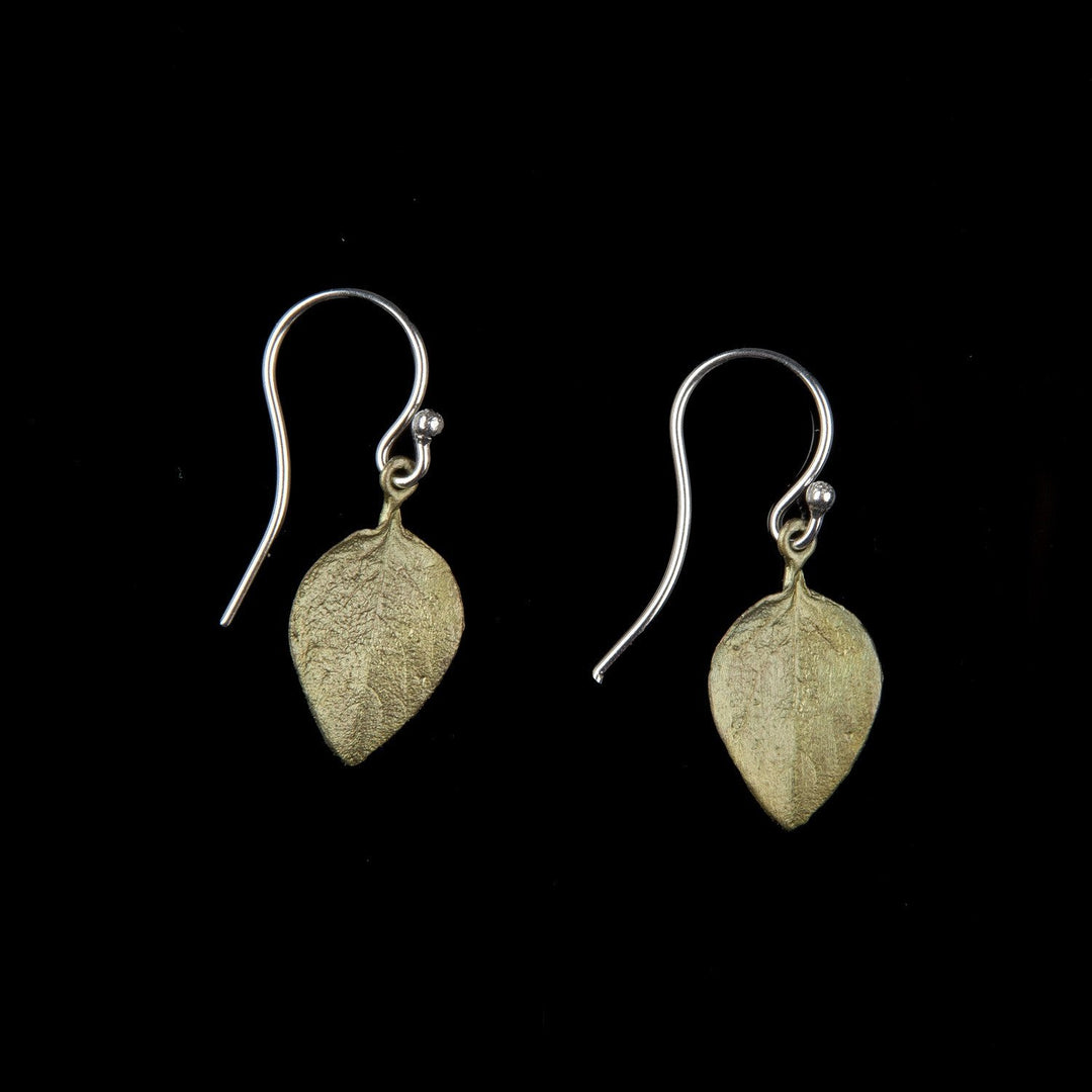 Image of the Michael Michaud Sweet Basil Earrings - Small Leaf on a black background