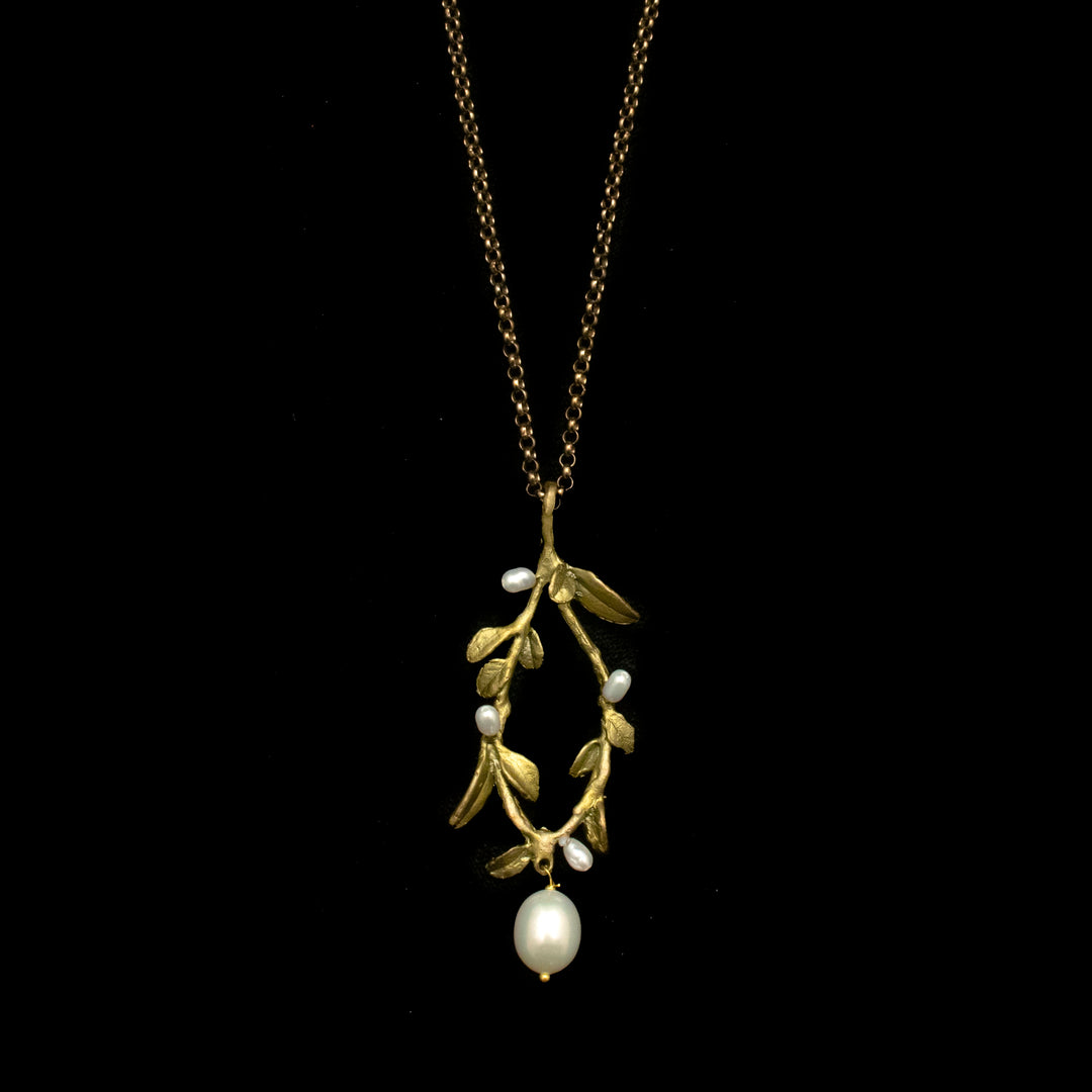 Image of the Michael Michaud Victorian Vine Oval Pendant on a black background