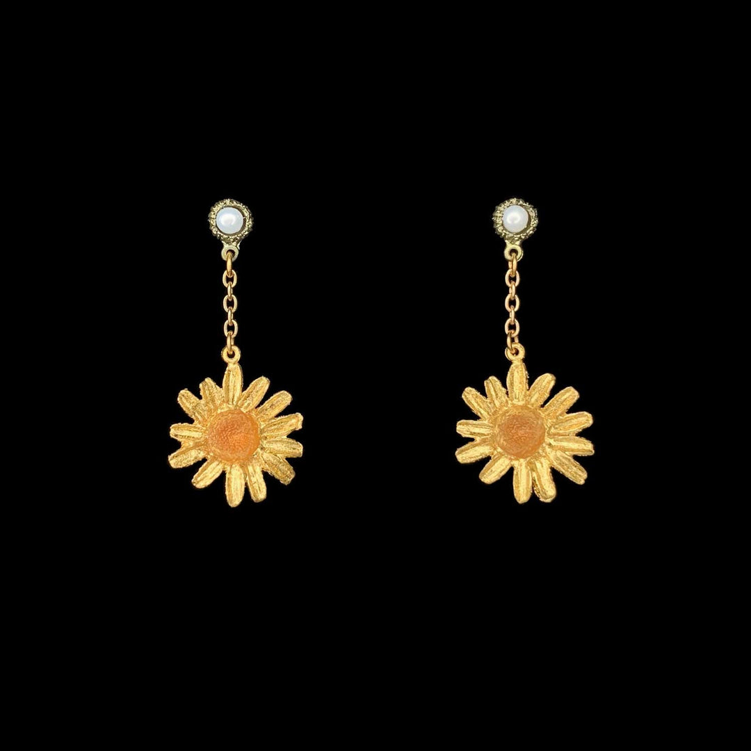 Image of the Michael Michaud Golden Butter Daisy Earrings - Pearl Dangle Post on a black background