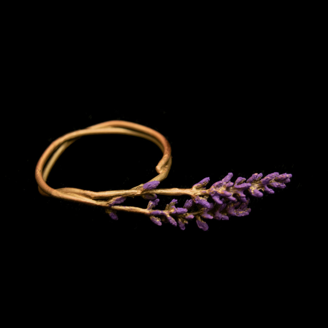 Image of the Michael Michaud Lavender Napkin Rings - Set of 4 on a black background